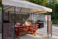 A patio or other outdoor area at Chalet Ester - Luxury Provençal House in Orava