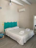 A bed or beds in a room at Casa il "Vignale"