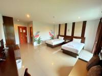 Postel nebo postele na pokoji v ubytování Peak Boutique City Hotel Krabi