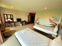 Postel nebo postele na pokoji v ubytování Peak Boutique City Hotel Krabi