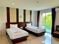 Postel nebo postele na pokoji v ubytování Peak Boutique City Hotel Krabi