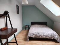 Łóżko lub łóżka w pokoju w obiekcie Charmant appartement au calme avec parking