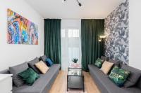 Posedenie v ubytovaní Apartament Kolorowe Balkony Czyżewskiego 3
