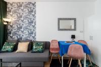 Posedenie v ubytovaní Apartament Kolorowe Balkony Czyżewskiego 3