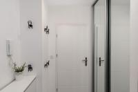Kúpeľňa v ubytovaní Apartament Kolorowe Balkony Czyżewskiego 3