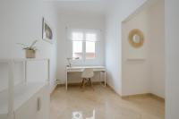 a white room with a desk and a chair at 4 Esquinas Adeje Homes in Adeje
