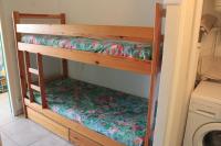 a couple of bunk beds in a room at Moliets plage, Résidence OPEN SUD in Moliets-et-Maa