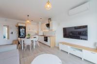 Kuchyňa alebo kuchynka v ubytovaní Apartamenty Sun & Snow Posesja Kapitańska