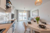 Kuchyňa alebo kuchynka v ubytovaní Apartamenty Sun & Snow Posesja Kapitańska