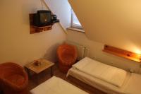 A television and/or entertainment centre at Penzión U Johna