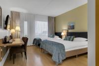 Aurora Hotel at Reykjavik-Keflavik Airport Terminal KEFにあるベッド