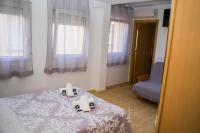 Postel nebo postele na pokoji v ubytování Hostal Goyesco Plaza