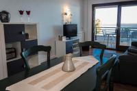 Televízia a/alebo spoločenská miestnosť v ubytovaní Miami APARTAMENTO CORI