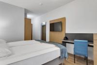 Aurora Hotel at Reykjavik-Keflavik Airport Terminal KEFにあるベッド