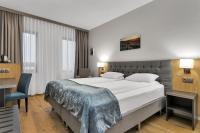 Aurora Hotel at Reykjavik-Keflavik Airport Terminal KEFにあるベッド