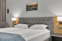 Aurora Hotel at Reykjavik-Keflavik Airport Terminal KEFにあるベッド