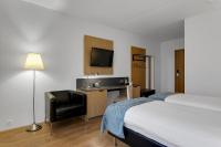 Aurora Hotel at Reykjavik-Keflavik Airport Terminal KEFにあるベッド