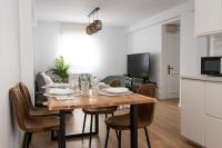 TV a/nebo společenská místnost v ubytování MyHouseSpain - Apartamento nuevo en Cimadevilla, Casco Antiguo