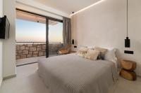 Posteľ alebo postele v izbe v ubytovaní Lido White Villa