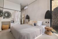 Posteľ alebo postele v izbe v ubytovaní Lido White Villa