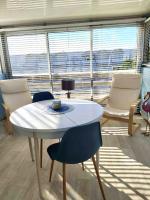 Posezení v ubytování Appartement grande terrasse Climatisé