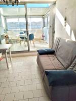 Posezení v ubytování Appartement grande terrasse Climatisé