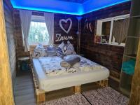 Posteľ alebo postele v izbe v ubytovaní Bambu Lodge @ Ossiachersee