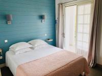 Hotel L'Océanにあるベッド