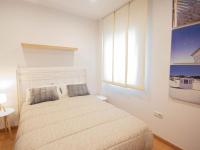 Posteľ alebo postele v izbe v ubytovaní Armilla Apartament
