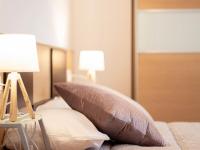 Posteľ alebo postele v izbe v ubytovaní Armilla Apartament