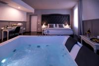 Villa Elisio Hotel & Spaにあるベッド