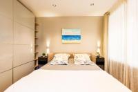 Łóżko lub łóżka w pokoju w obiekcie LE MAY AP4338 By Riviera Holiday Homes