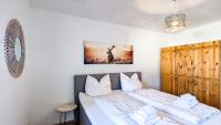 Postel nebo postele na pokoji v ubytování Ferienwohnung Landliebe