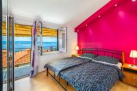 Postel nebo postele na pokoji v ubytování Apartment in Crikvenica 27606