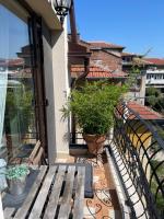 A balcony or terrace at Luxury Central Apartment
