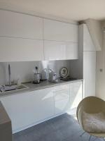 A kitchen or kitchenette at Luxury Central Apartment