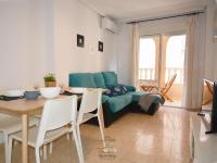 A seating area at Cozy apartment in downtown area