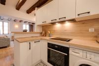 Kuchyňa alebo kuchynka v ubytovaní Le Grenette - Appartement pour 2 à 4 personnes en plein coeur d'Annecy