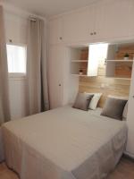 Postel nebo postele na pokoji v ubytování Appartement moderne première ligne de mer Santa