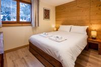 Posteľ alebo postele v izbe v ubytovaní Chalet des Favrands