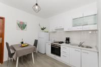 Kuchyň nebo kuchyňský kout v ubytování Apartments Silvana