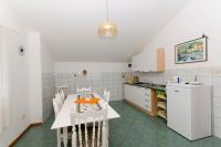 Kuchyňa alebo kuchynka v ubytovaní Apartment and Rooms Mate