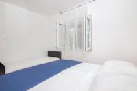Posteľ alebo postele v izbe v ubytovaní Apartment Adriatico