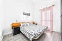 Postel nebo postele na pokoji v ubytování DUPLEX en GREEN OASIS