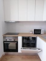 Kuchyň nebo kuchyňský kout v ubytování CASA DA PRAIA DA POÇA - APARTAMENTO TULIPA