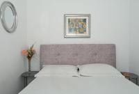 Posteľ alebo postele v izbe v ubytovaní Apartments Nikica