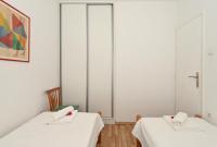 Posteľ alebo postele v izbe v ubytovaní Apartments Nikica