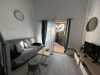 Część wypoczynkowa w obiekcie Pavillon T3 avec Mezzanine, Parking, Piscine, Clim, proche plage et commerces, animaux acceptés - FR-1-702-31