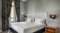 Posteľ alebo postele v izbe v ubytovaní Hotel Larios Málaga