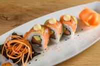 een witte plaat met sushi en groenten op een tafel bij San Lameer Villa 3303 - 2 Bedroom Classic - 4 pax - San Lameer Rental Agency in Southbroom